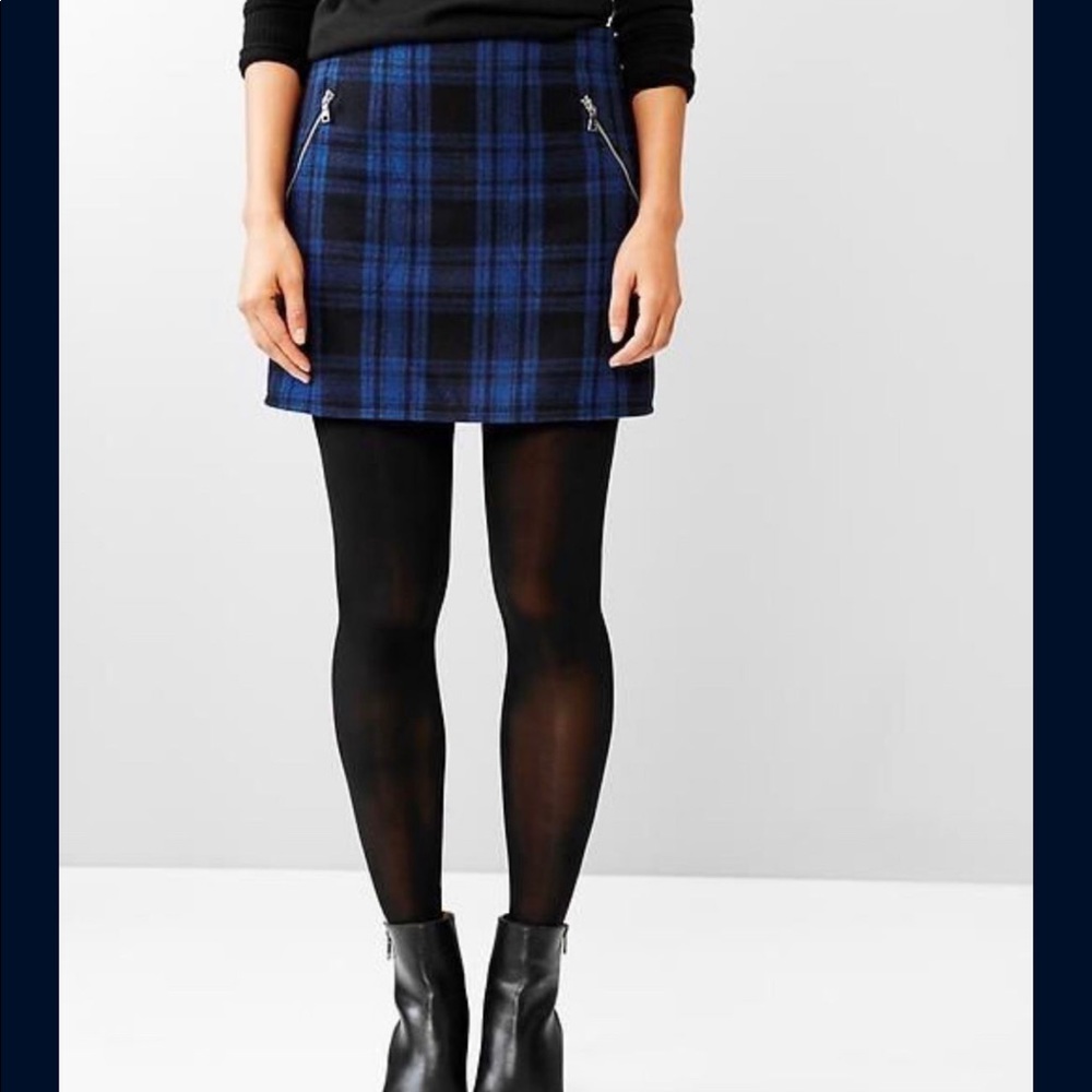 Blue and Black  striped wool lined mini with side zippers  size 4 . Never worn.